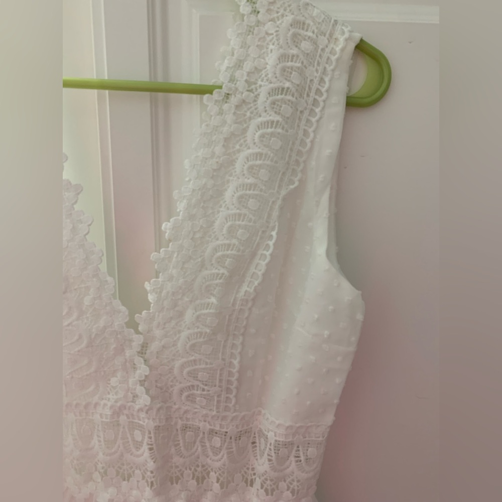 White dress. Never worn. Small.